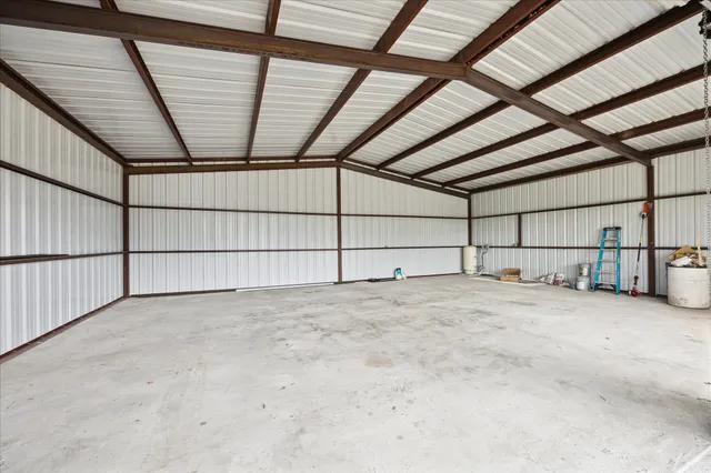 a view of a lake with a yard