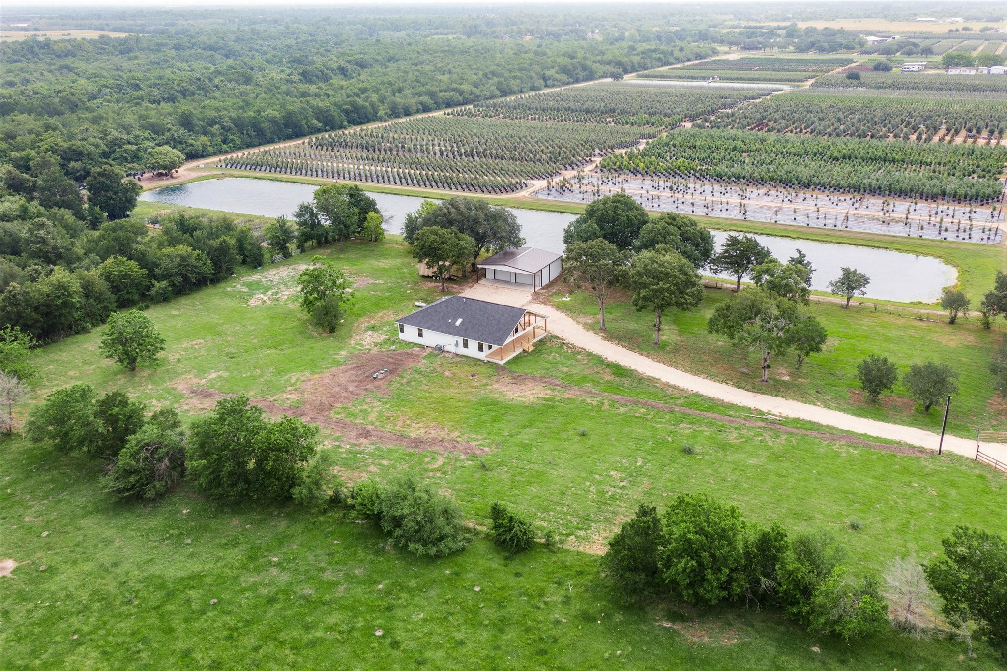 1935 Willow Road Wallis, TX 77485 - Photo 34 of 34 a view of a lake with a yard
