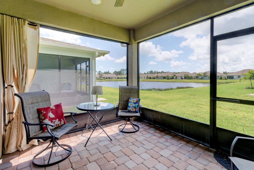 6035 Red Maple Manor Vero Beach, FL 32966 - Photo 25 of 36 a view of a room with lounge chairs in patio