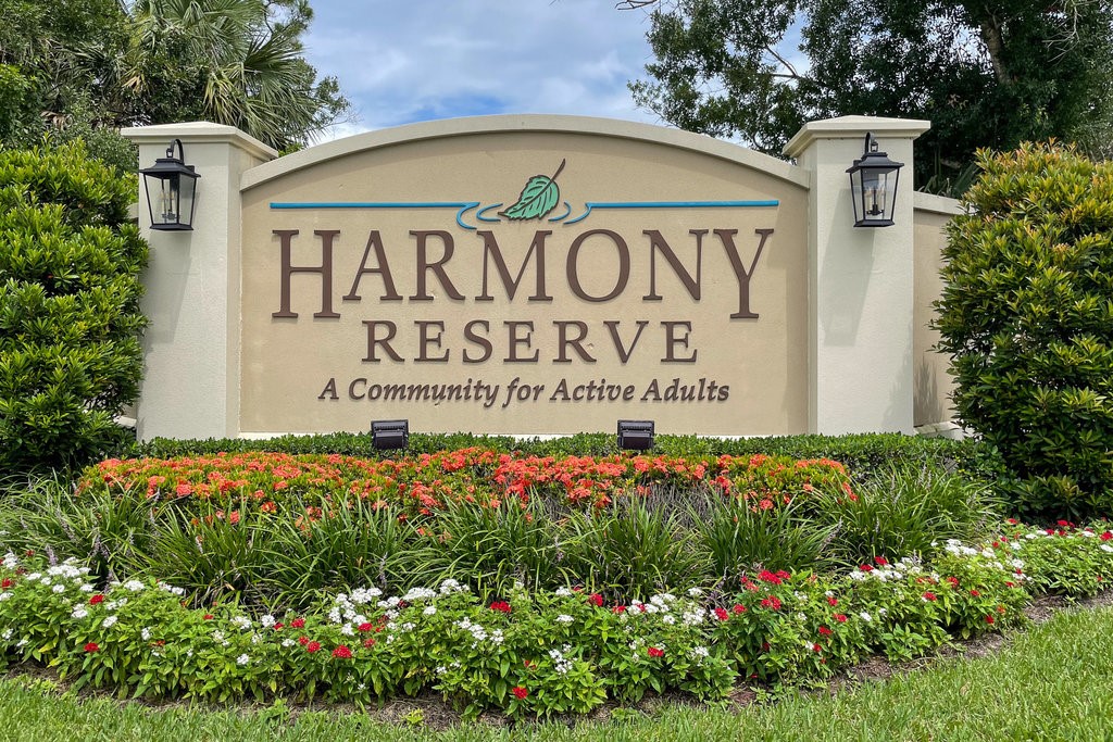 6035 Red Maple Manor Vero Beach, FL 32966 - Photo 36 of 36 a sign on the side of the building