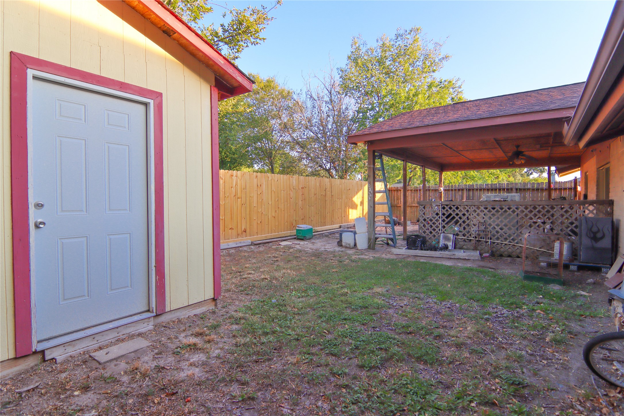 9710 Wind Flower Lane Houston, TX 77086 - Photo 18 of 21 a backyard of a house with seating space