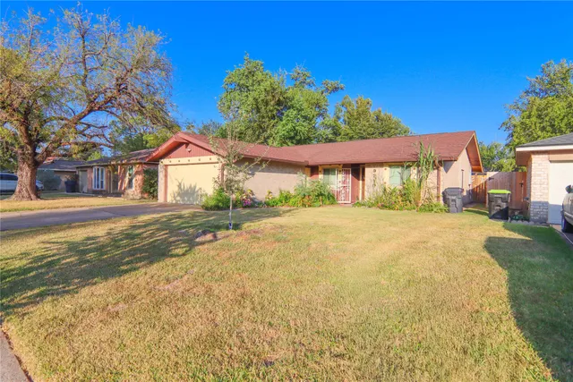 a house with a garden in front of it