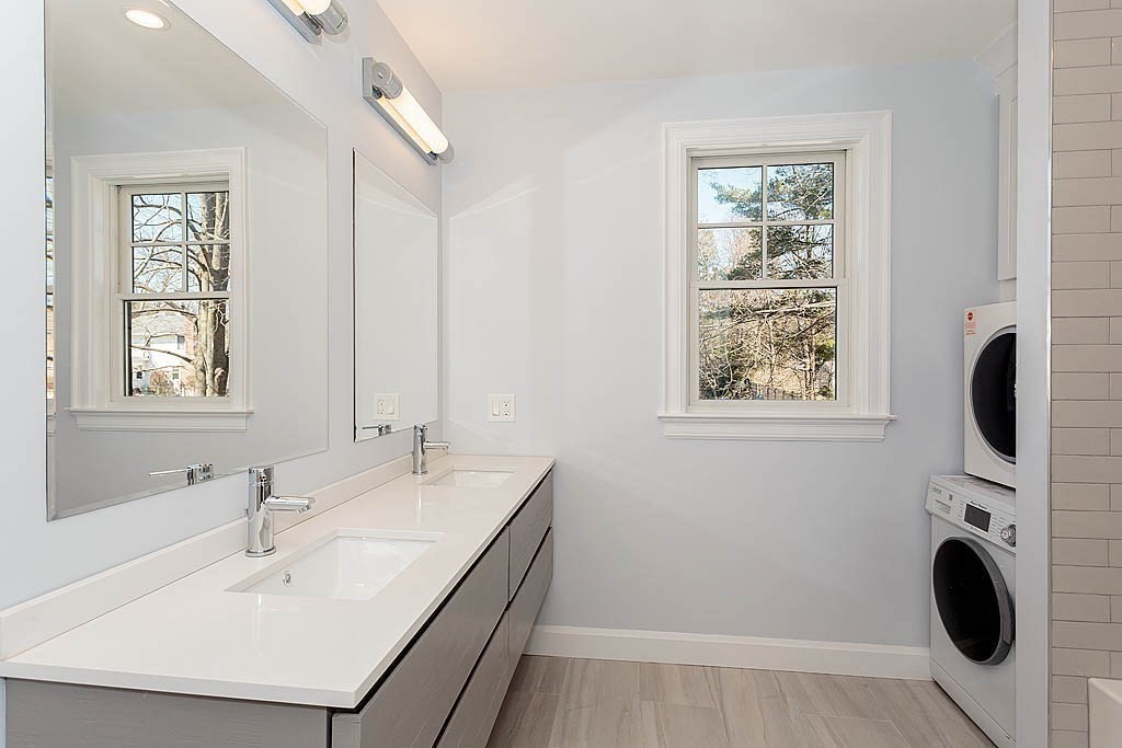 258 Reedsdale Road Milton, MA 02186 - Photo 23 of 34 a bathroom with a sink and a mirror