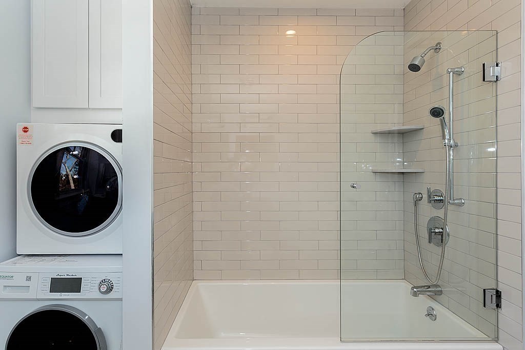 258 Reedsdale Road Milton, MA 02186 - Photo 24 of 34 a bathroom with a sink a mirror and a shower