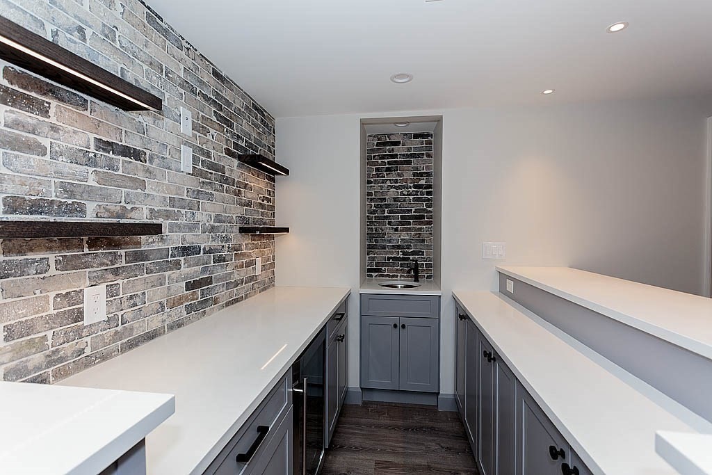 258 Reedsdale Road Milton, MA 02186 - Photo 29 of 34 a kitchen with a sink and cabinets