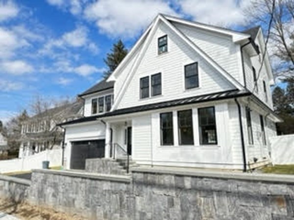 258 Reedsdale Road Milton, MA 02186 - Photo 3 of 34 a view of a white house with large windows