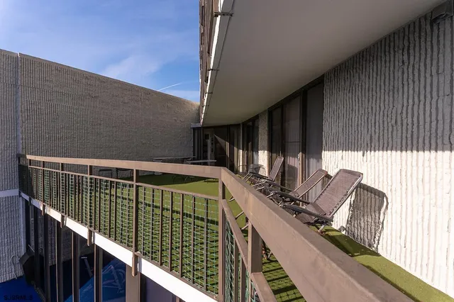 a view of a balcony with city view
