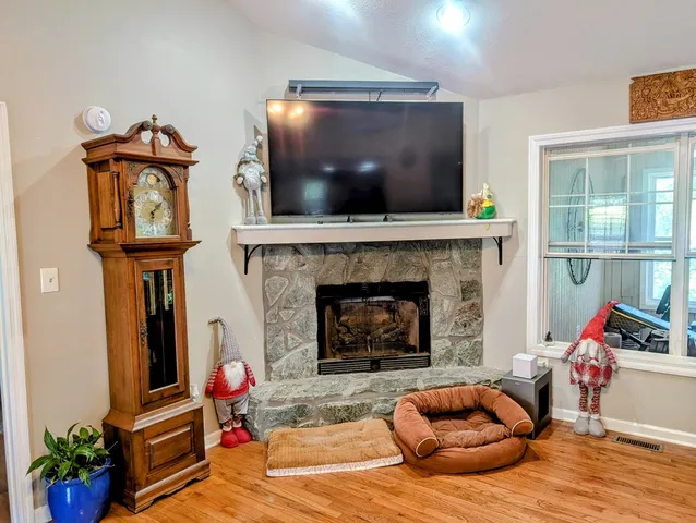 a bedroom with bed and window