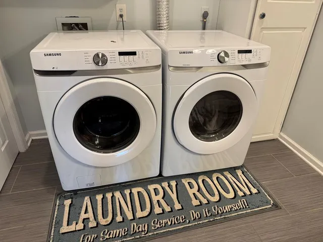 a room with a fireplace and painted walls