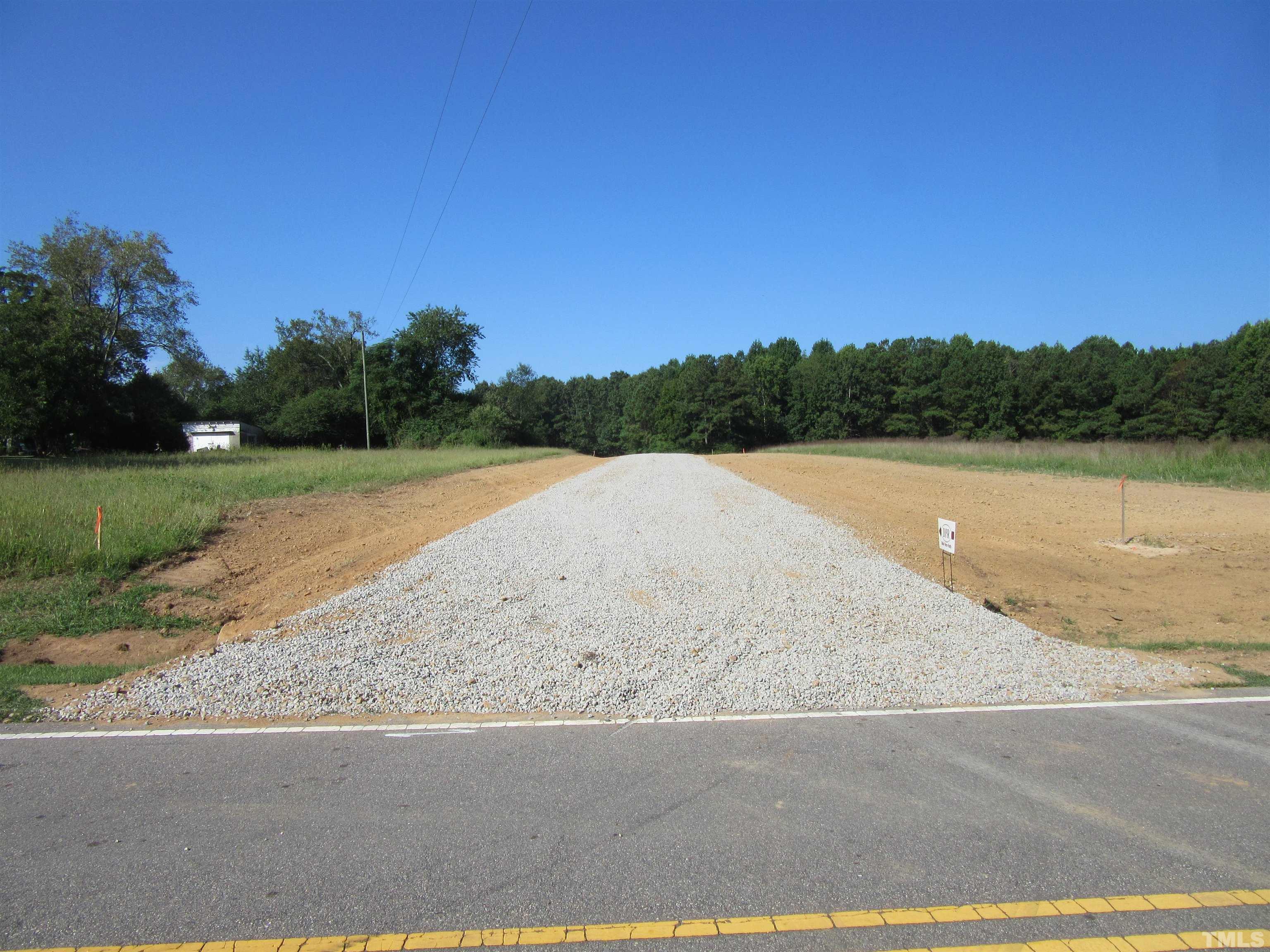 Lot 2 Seven Paths Road Spring Hope, NC 27882 - Photo 13 of 18 a view of a lake with a mountain in the background