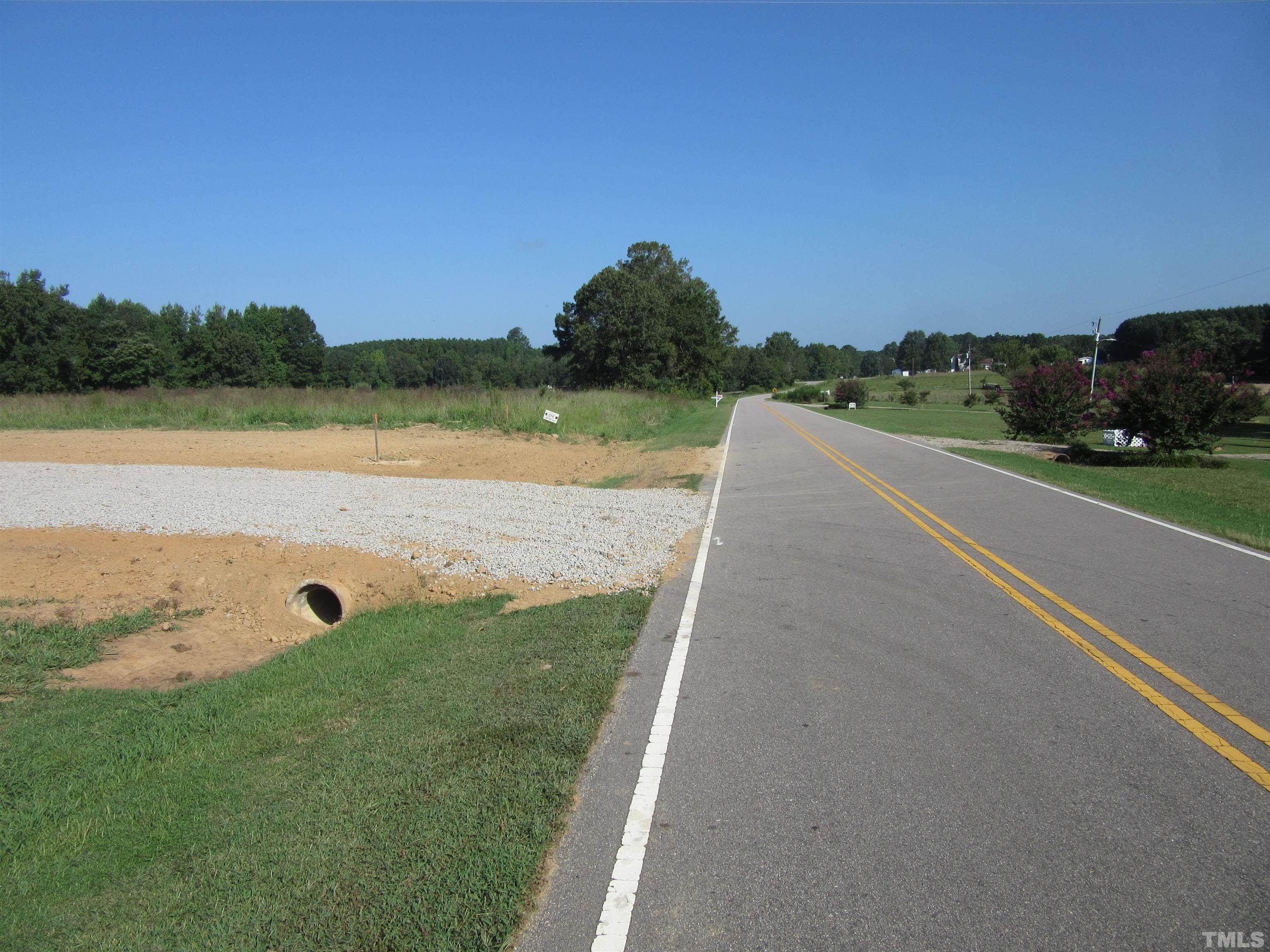Lot 2 Seven Paths Road Spring Hope, NC 27882 - Photo 8 of 18 a view of a lake with a big yard