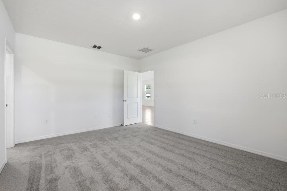 13640 Tropical Breeze Way Hudson, FL 34669 - Photo 15 of 48 a view of an empty room