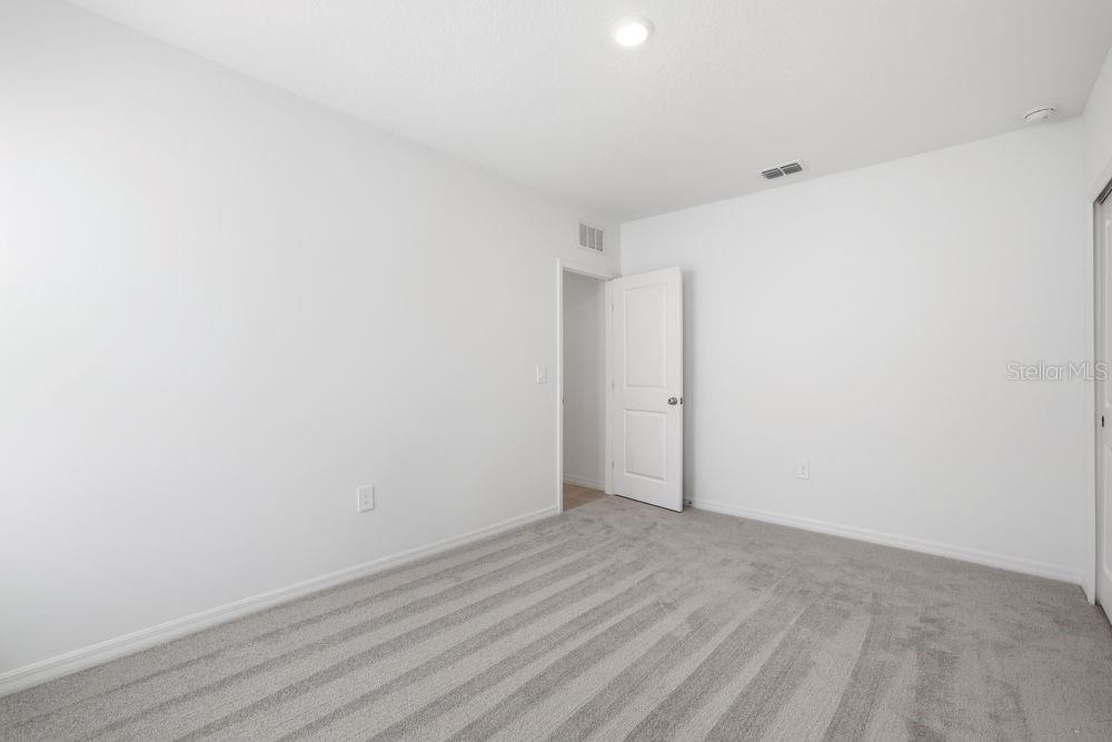 13640 Tropical Breeze Way Hudson, FL 34669 - Photo 21 of 48 a view of an empty room