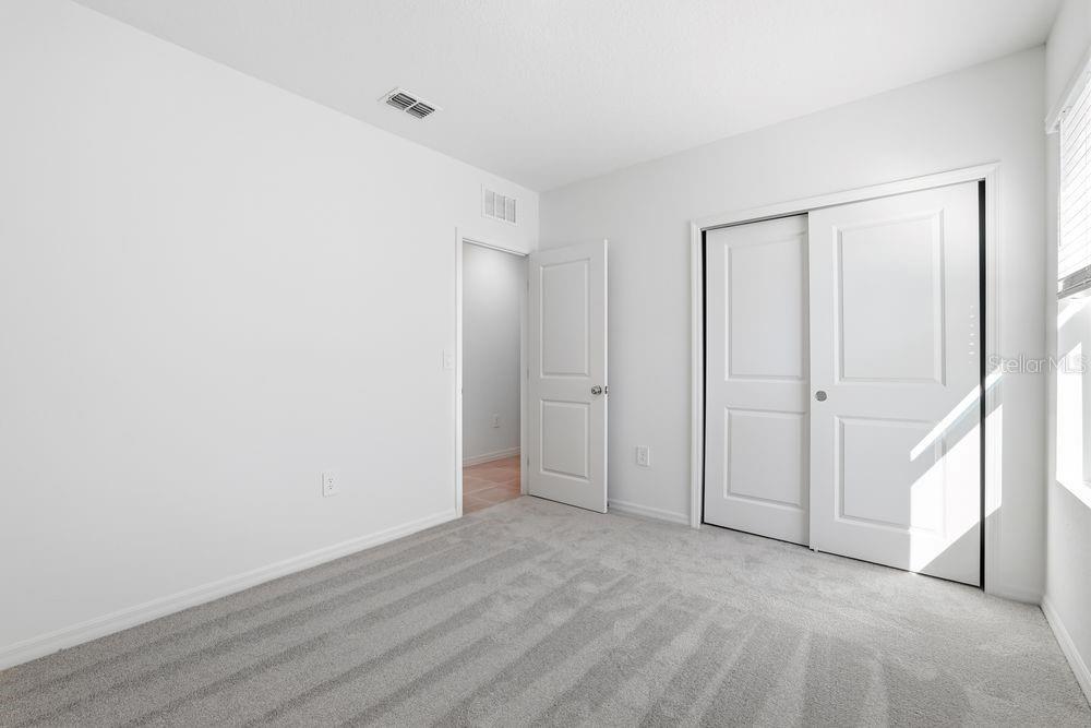 13640 Tropical Breeze Way Hudson, FL 34669 - Photo 25 of 48 a view of an empty room