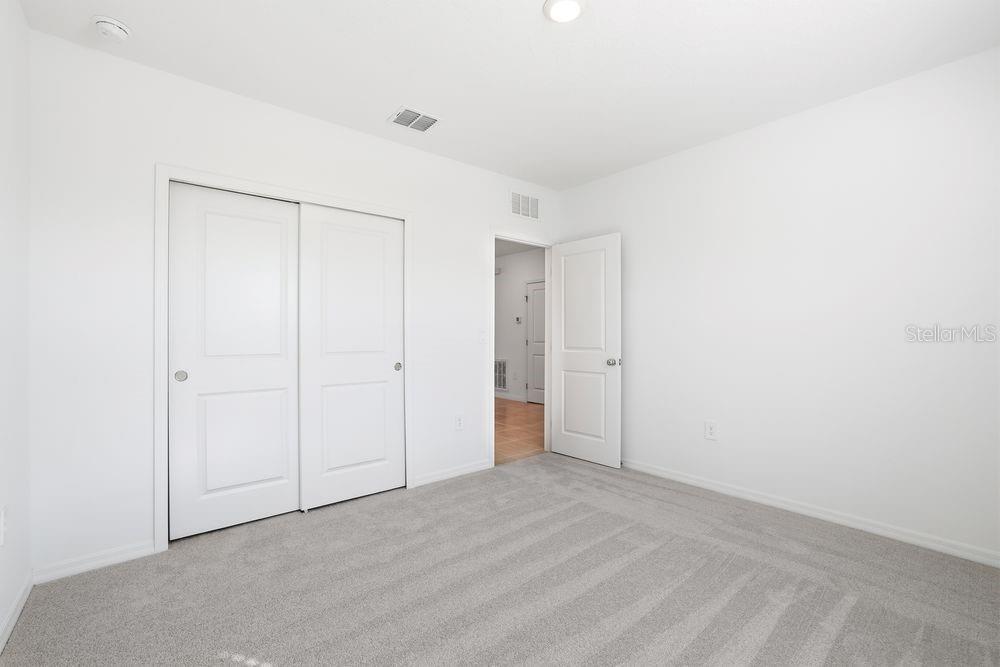 13640 Tropical Breeze Way Hudson, FL 34669 - Photo 26 of 48 a view of an empty room