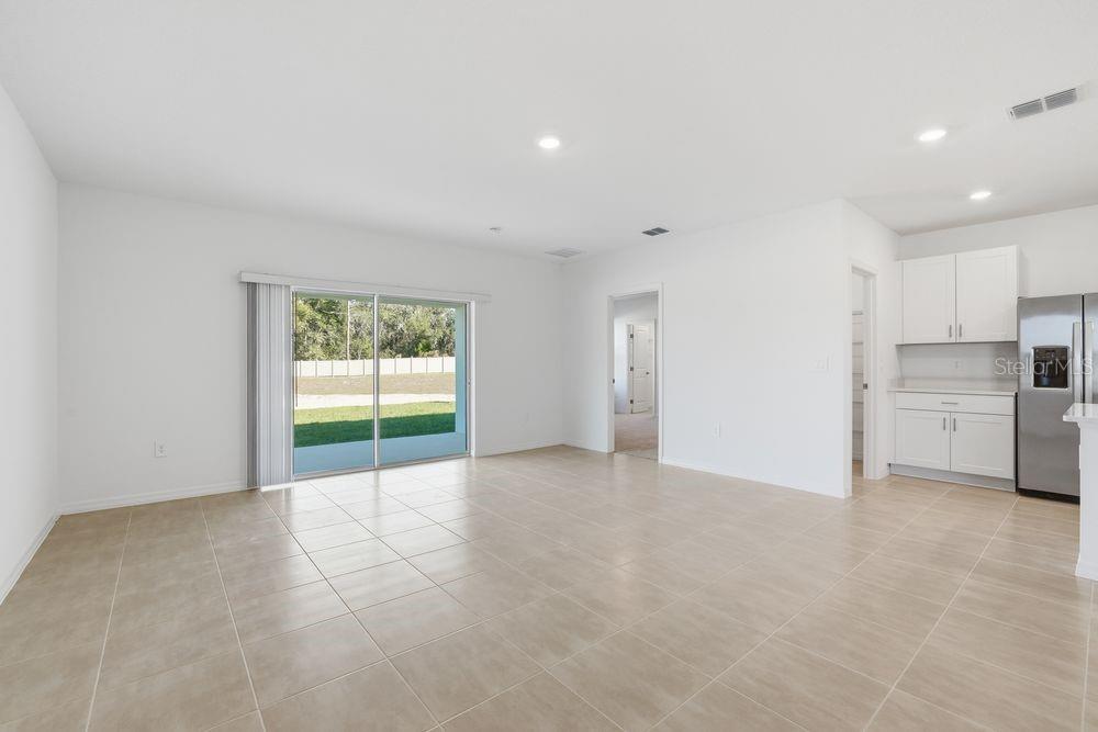 13640 Tropical Breeze Way Hudson, FL 34669 - Photo 10 of 48 a view of an empty room with a window