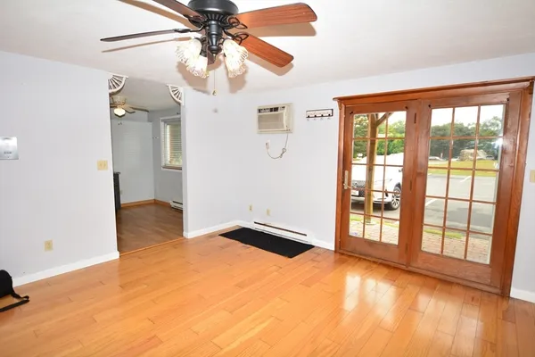 a view of an empty room with a window