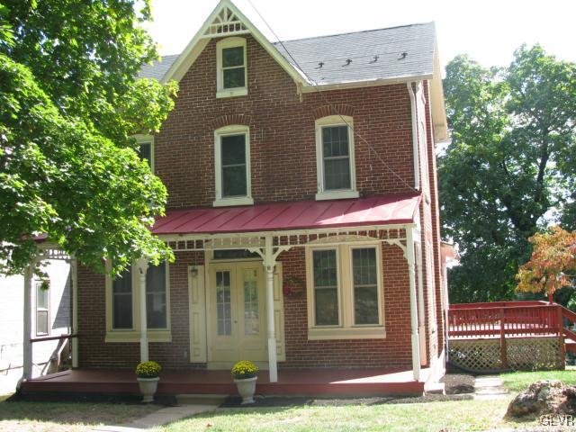 621 Friedensburg Road Reading, PA 19606 - Photo 1 of 17 a front view of a house with garden