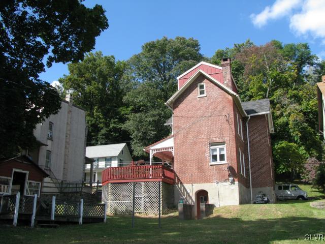 621 Friedensburg Road Reading, PA 19606 - Photo 15 of 17 a front view of house with yard and trees