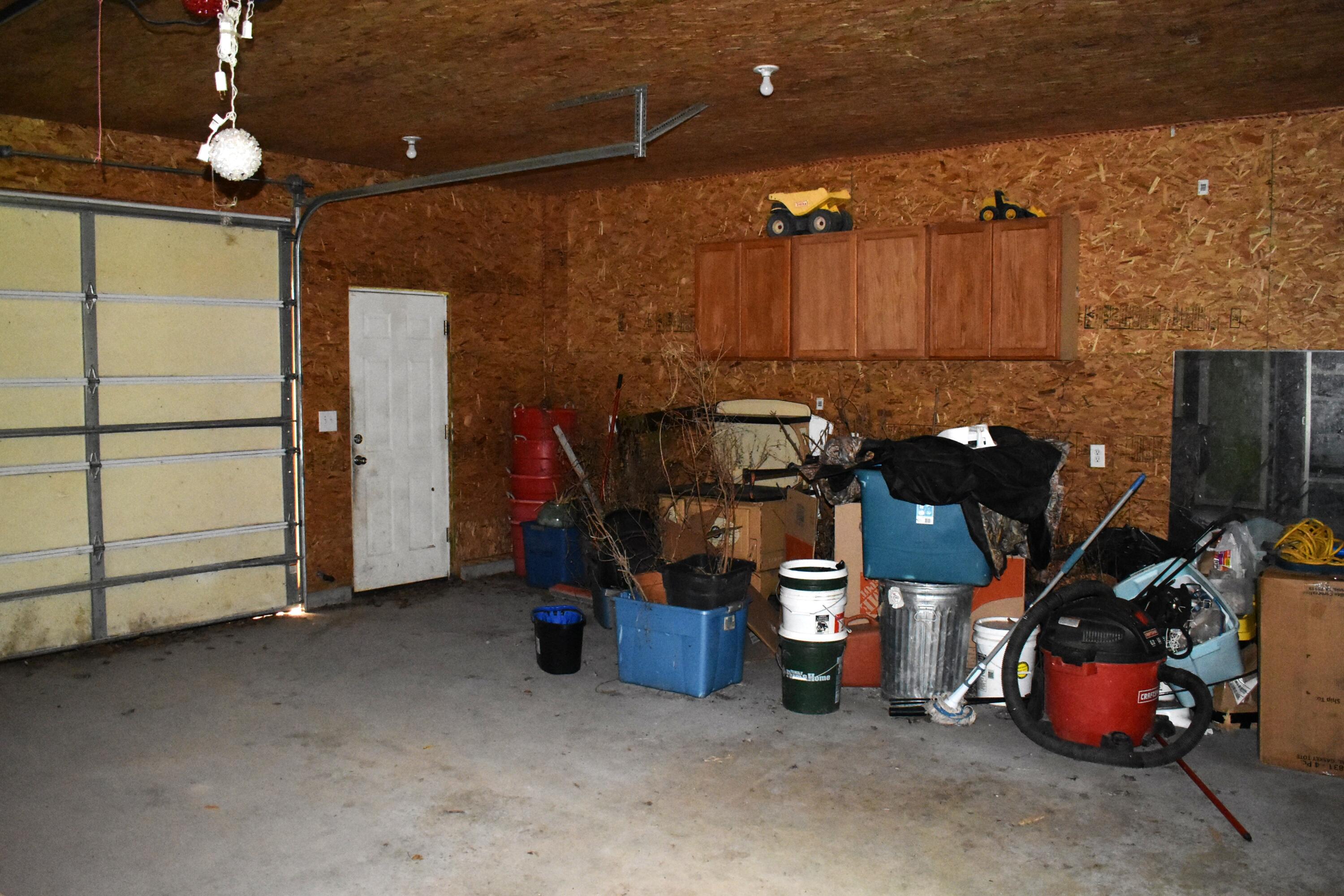 8275 Rough Road Atlanta, MI 49709 - Photo 25 of 37 Garage