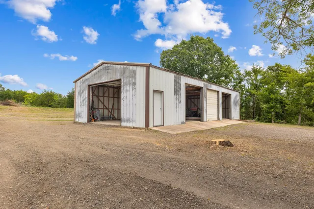 a view of a house with a outdoor space and shower