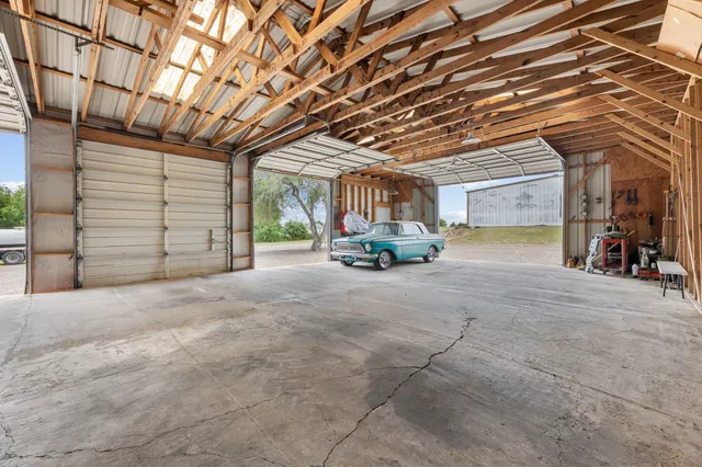 a view of a big room with wooden walls