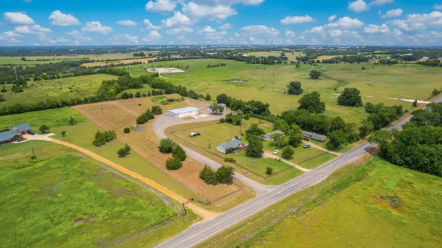 a view of a lake with a big yard