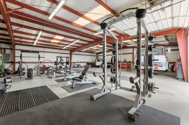 a view of a room with gym equipment