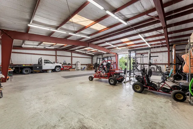a view of parking garage with cars