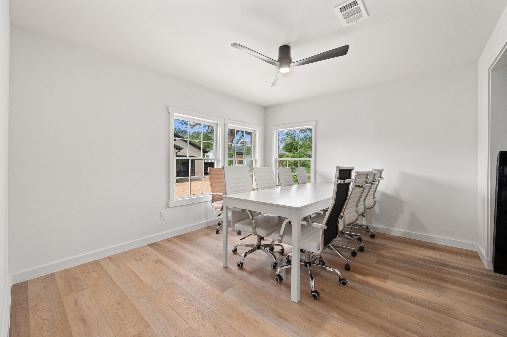 3501 Pecan Springs Road Austin, TX 78723 - Photo 29 of 40 Office area with light wood finished floors and a ceiling fan