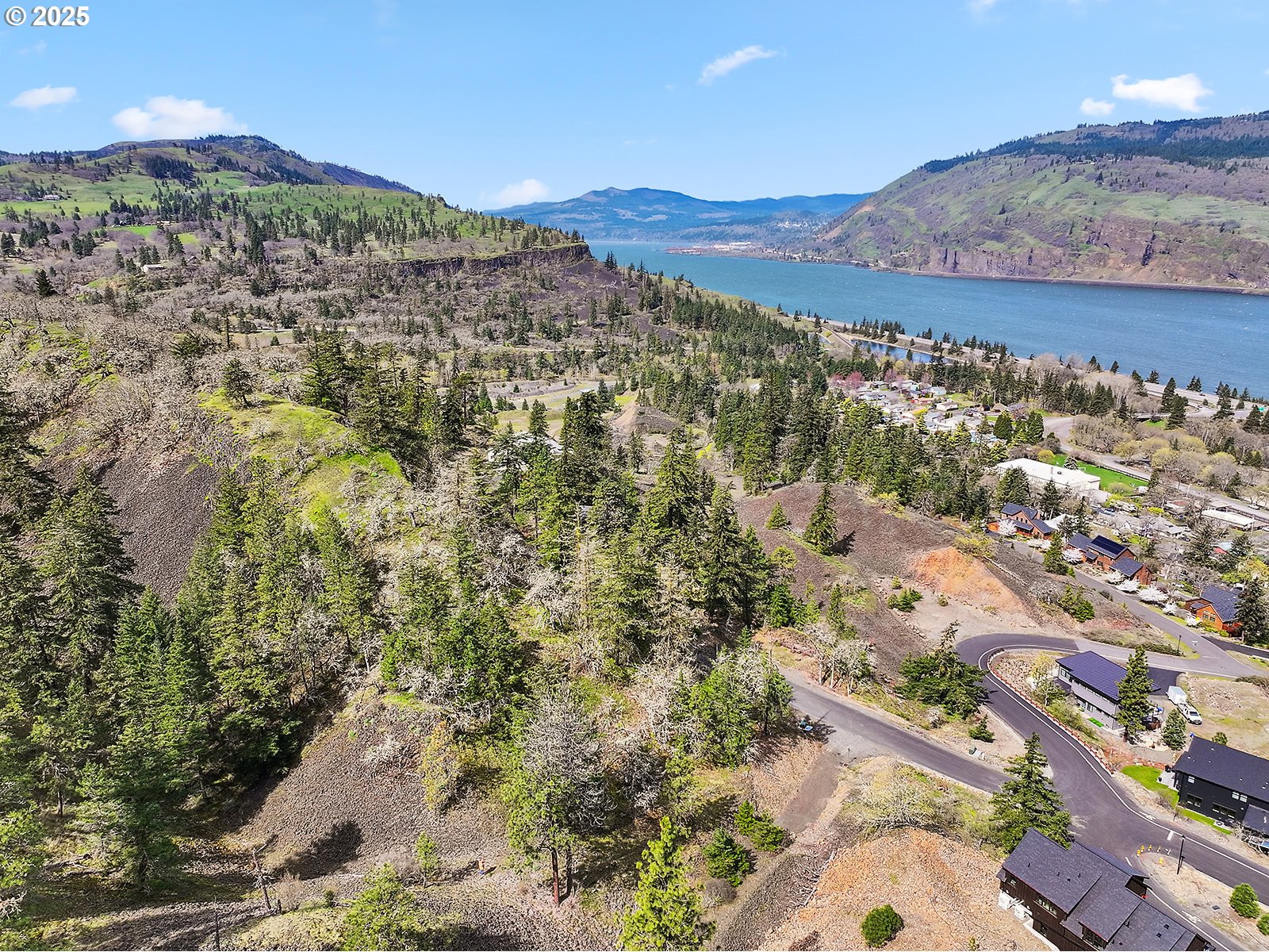 Asher Street, Unit 37 Mosier, OR 97040 - Photo 28 of 39 a view of a city with mountains in the background