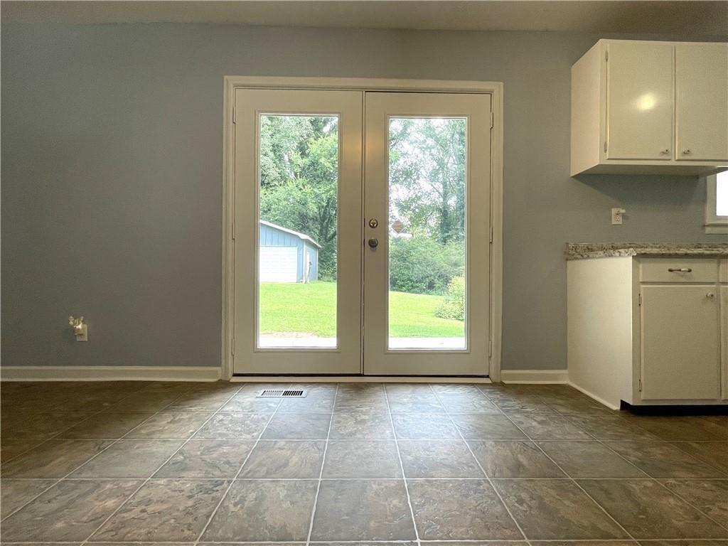 414 Landers Drive Southwest Mableton, GA 30126 - Photo 13 of 44 an empty room with windows