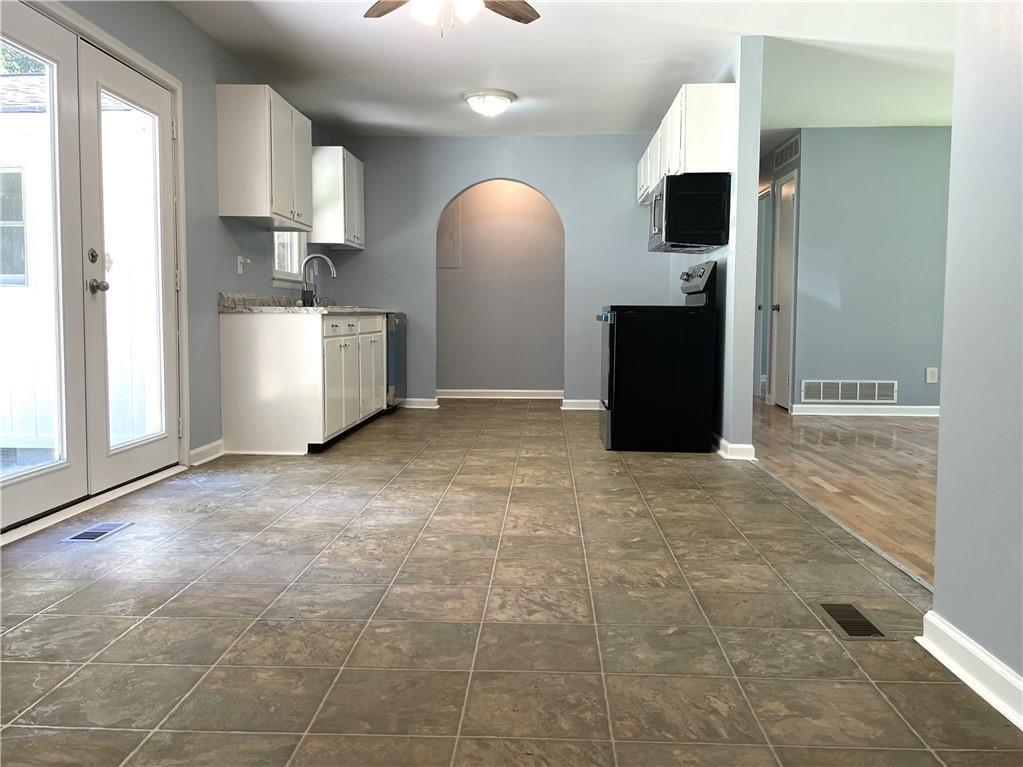 414 Landers Drive Southwest Mableton, GA 30126 - Photo 14 of 44 a view of a kitchen with a sink