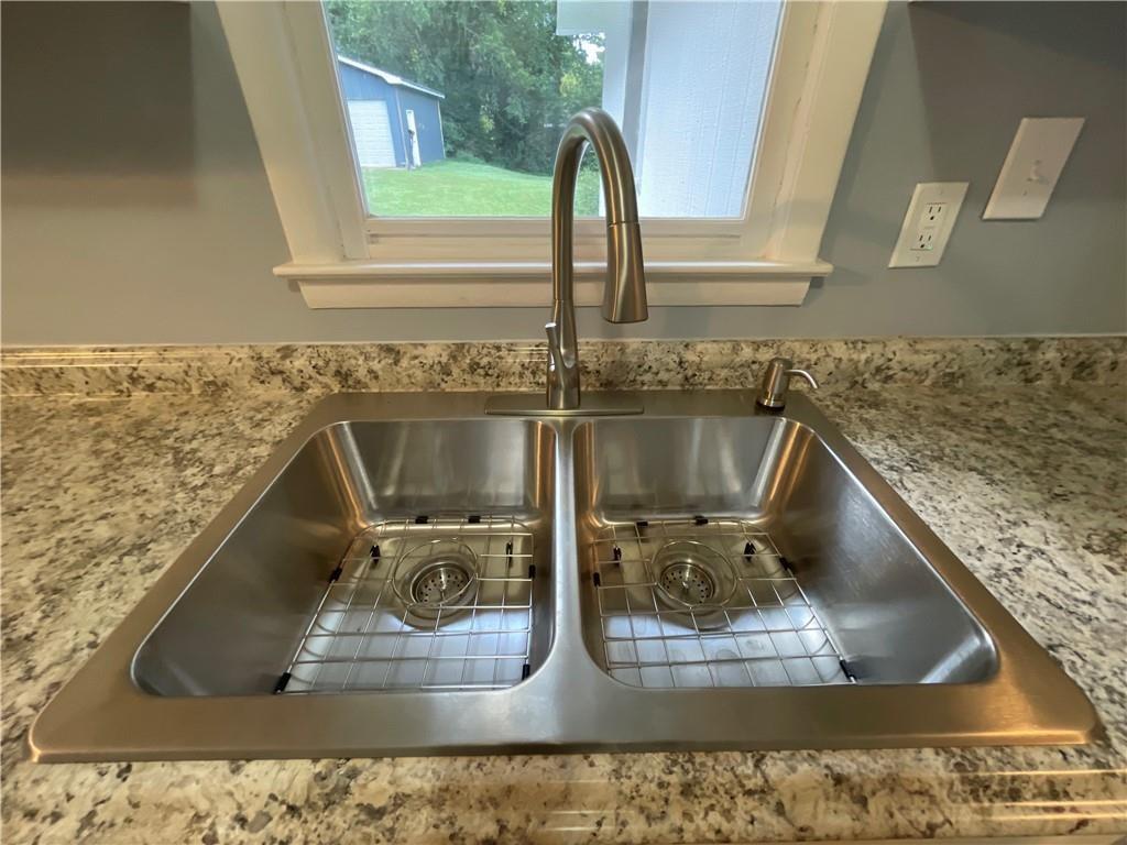 414 Landers Drive Southwest Mableton, GA 30126 - Photo 18 of 44 a view of water heater room with wooden floor