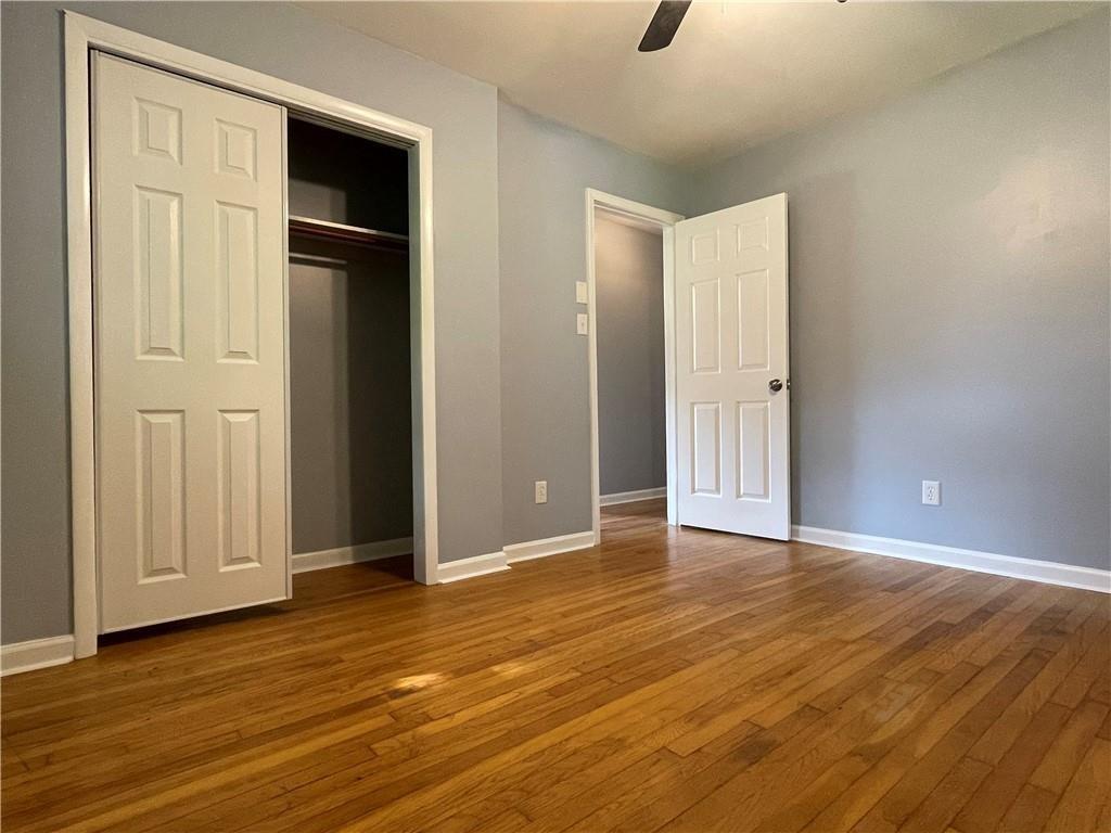 414 Landers Drive Southwest Mableton, GA 30126 - Photo 25 of 44 a view of an empty room with wooden floor