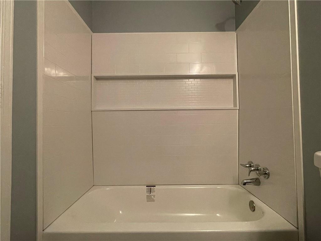 414 Landers Drive Southwest Mableton, GA 30126 - Photo 27 of 44 a bathroom with a bathtub