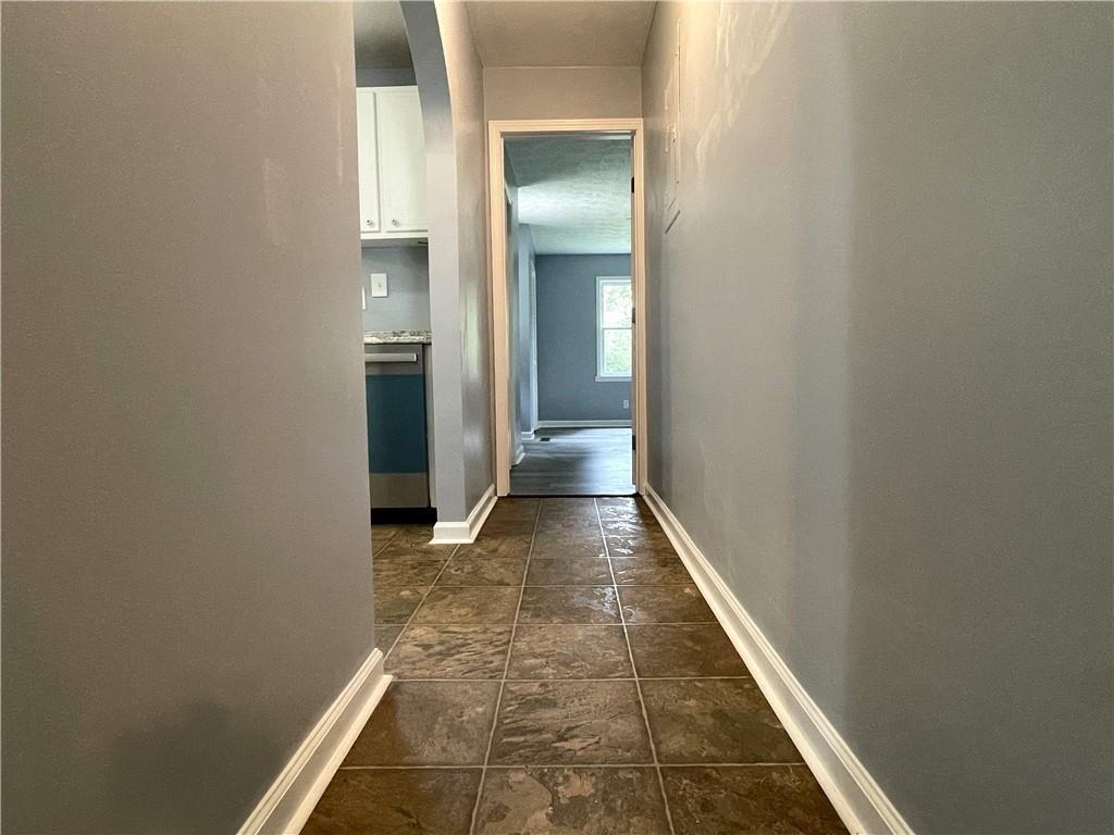 414 Landers Drive Southwest Mableton, GA 30126 - Photo 28 of 44 a view of a hallway with wooden floor