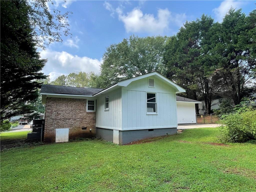 414 Landers Drive Southwest Mableton, GA 30126 - Photo 33 of 44 a view of a house with a yard