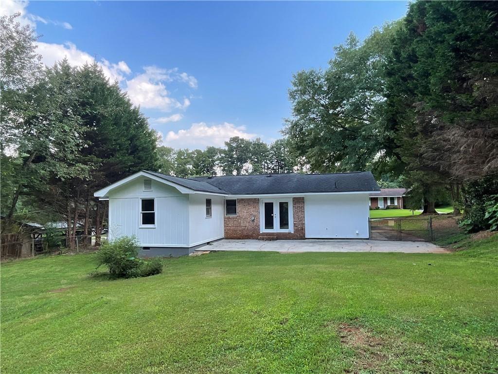 414 Landers Drive Southwest Mableton, GA 30126 - Photo 34 of 44 a house view with a garden space