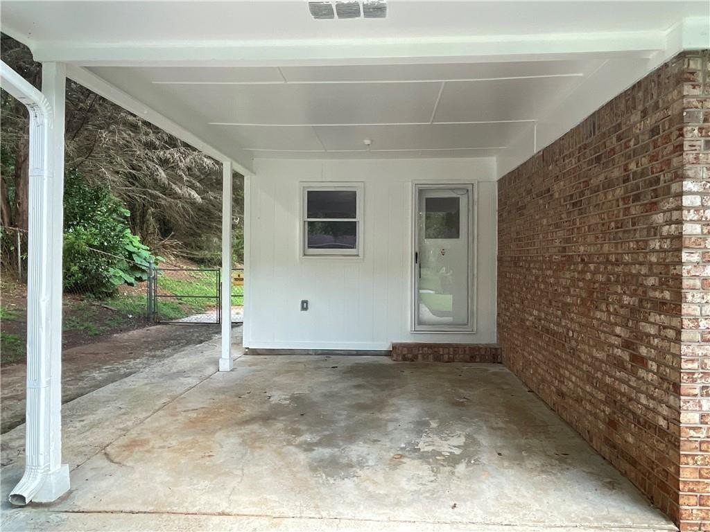 414 Landers Drive Southwest Mableton, GA 30126 - Photo 41 of 44 a view of a house with a porch