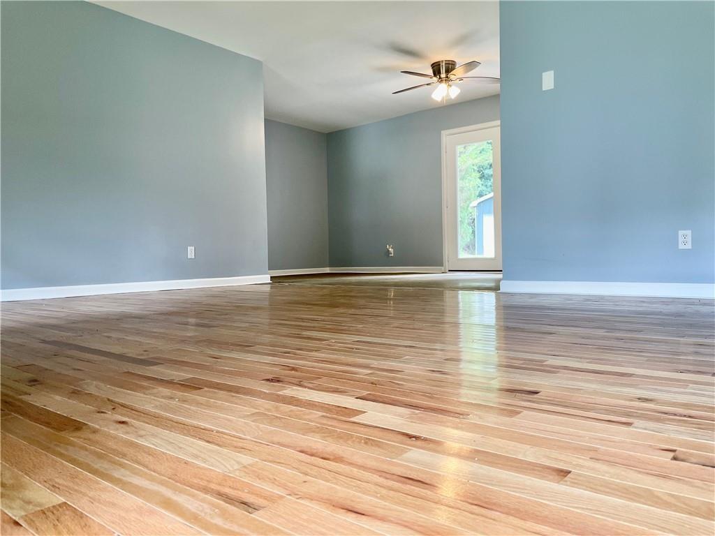 414 Landers Drive Southwest Mableton, GA 30126 - Photo 7 of 44 a view of a room with wooden floor and cabinet