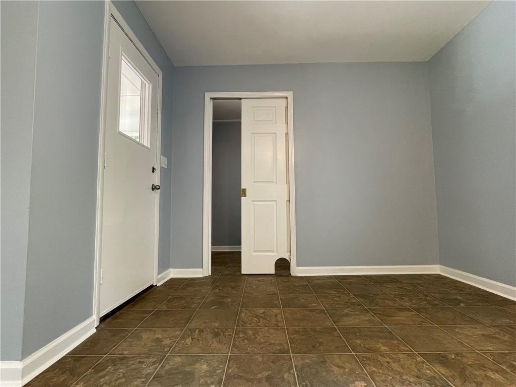 414 Landers Drive Southwest Mableton, GA 30126 - Photo 10 of 44 an empty room with a natural light