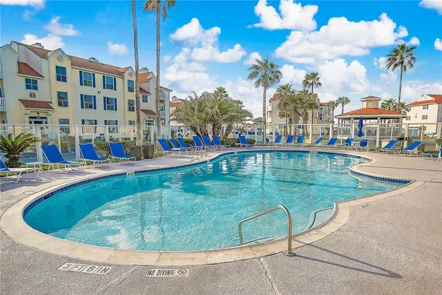 a view of a swimming pool with a playground