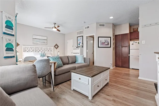 a living room with furniture and a table