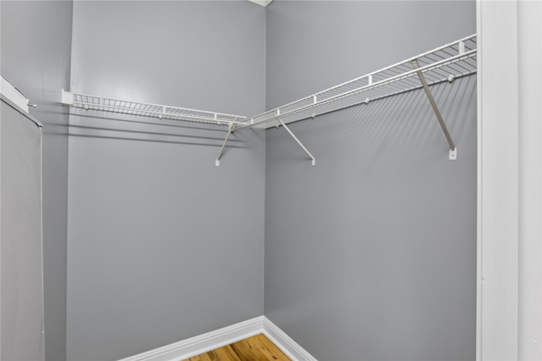 564 Fairfield Road Walhalla, SC 29691 - Photo 22 of 50 Functional wire shelving maximizes organization in this closet featuring classic wood flooring.