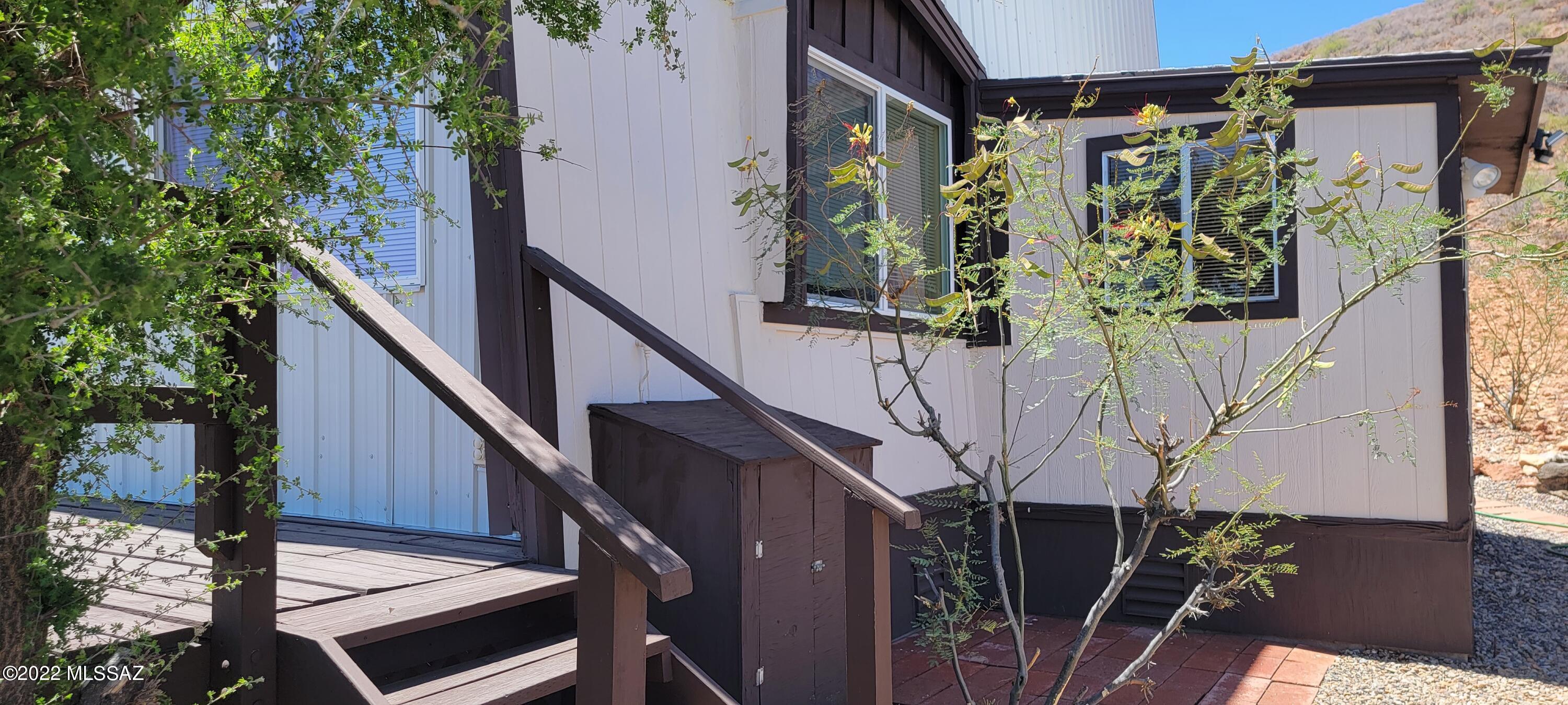 3399 Red Stag Road Pearce, AZ 85625 - Photo 10 of 47 a view of balcony with wooden floor and seating space