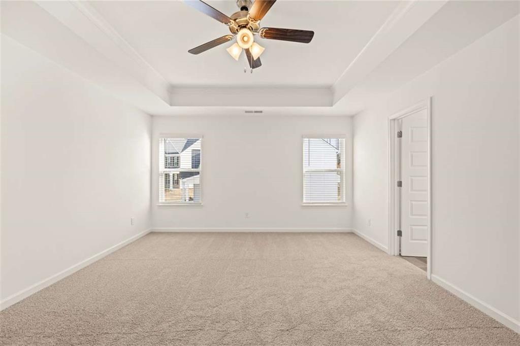1851 Lacebark Elm Way Lawrenceville, GA 30045 - Photo 33 of 63 a view of an empty room with a window