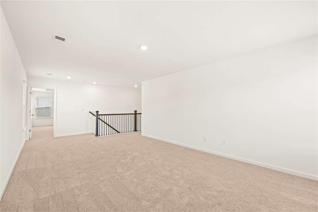 1851 Lacebark Elm Way Lawrenceville, GA 30045 - Photo 43 of 63 a view of a livingroom with a furniture