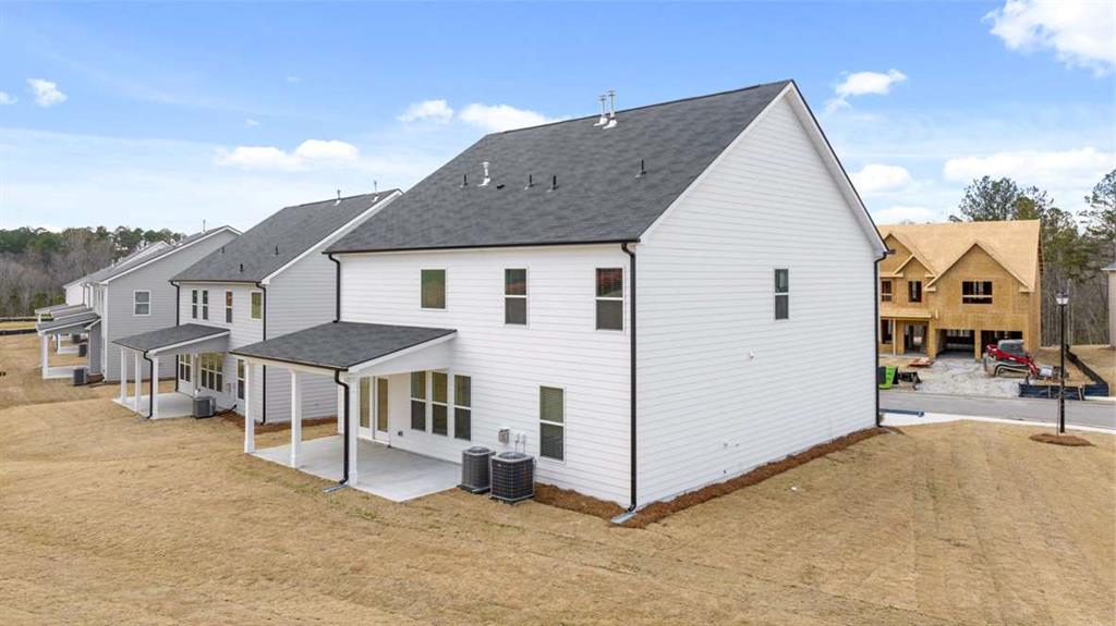 1851 Lacebark Elm Way Lawrenceville, GA 30045 - Photo 55 of 63 a view of a house with a yard