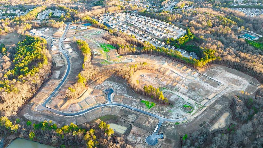 1851 Lacebark Elm Way Lawrenceville, GA 30045 - Photo 61 of 63 an aerial view of a swimming pool with outdoor seating and yard